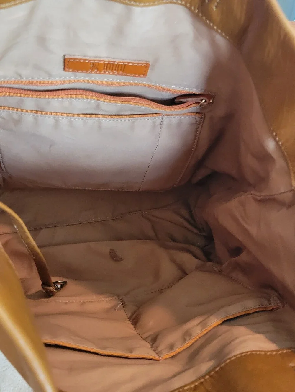 Hobo Classic Brown Leather Tote Bag With Roomy Interior.